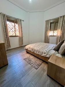 Postelja oz. postelje v sobi nastanitve MyZo Superbe Appartement familial bien situé à Marrakech