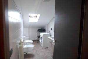 a bathroom with two toilets and a sink at B&B Vista Mare "Terrazzo" in Palmi +31 photos