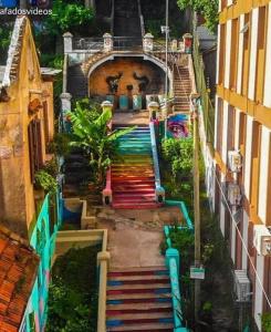 an aerial view of a stairway between two buildings at Apto Centro Histórico ótima localização e iluminado in Porto Alegre