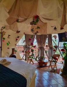 Katil atau katil-katil dalam bilik di Glamping Cabañas Luz y Vida