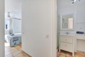 Postel nebo postele na pokoji v ubytování SunsetView apartment El Cotillo 2-4 personas