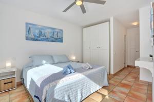 Postel nebo postele na pokoji v ubytování SunsetView apartment El Cotillo 2-4 personas