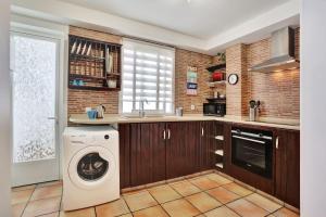 Kuchyň nebo kuchyňský kout v ubytování SunsetView apartment El Cotillo 2-4 personas