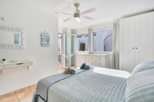 Postel nebo postele na pokoji v ubytování SunsetView apartment El Cotillo 2-4 personas