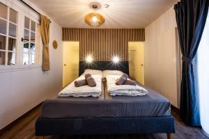 Letto o letti in una camera di BoRa Apartments