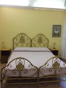 Un ou plusieurs lits dans un hébergement de l'établissement La Casa di Mamma