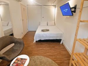 Voodi või voodid majutusasutuse Hostel Pluto toas