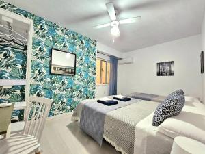 Postel nebo postele na pokoji v ubytování Centric Rooms Mercado