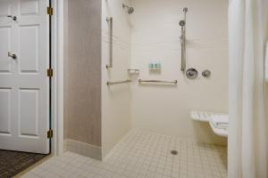 a bathroom with a toilet and a shower at Residence Inn San Jose South/Morgan Hill in Morgan Hill