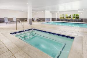 a swimming pool in a hotel room with a pool at Residence Inn San Jose South/Morgan Hill in Morgan Hill