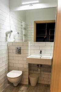Kúpeľňa v ubytovaní Villa Sosnowe Wzgórze
