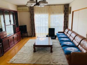 Χώρος καθιστικού στο Amitie Villa