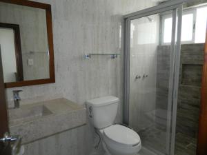 Baðherbergi á ACL Suites