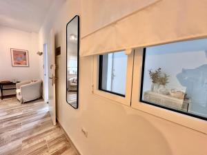 TV a/nebo společenská místnost v ubytování Eden Gomera Suites