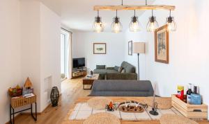 TV a/nebo společenská místnost v ubytování Seepanorama Apartments am Grundlsee