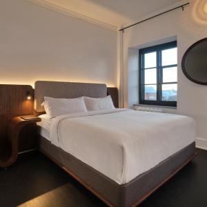Postel nebo postele na pokoji v ubytování Hotel Cap Diamant