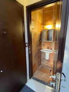 a bathroom with a shower and a sink at 3 bedrooms flat,fully equipped in Cairo