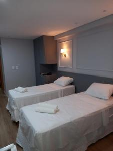 Postel nebo postele na pokoji v ubytování Manaíra Apart Hotel - Flat 1606 + 15 fotografií