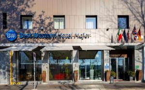 a building with a sign that reads best western guest maker at Best Western Hotel Major in Milan