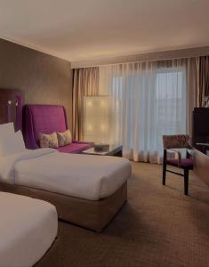 Voodi või voodid majutusasutuse Radisson Blu Hotel, Cairo Heliopolis toas
