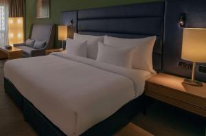 Voodi või voodid majutusasutuse Radisson Blu Hotel, Cairo Heliopolis toas