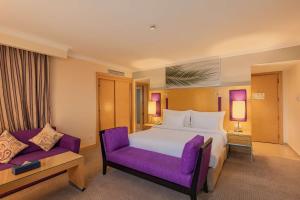 Voodi või voodid majutusasutuse Radisson Blu Hotel, Cairo Heliopolis toas