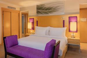 Voodi või voodid majutusasutuse Radisson Blu Hotel, Cairo Heliopolis toas