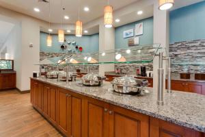 a kitchen with two pots on a counter at Drury Inn & Suites Fort Myers Airport FGCU in Fort Myers