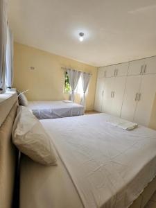 Cama o camas de una habitación en Villa sol de Samana'