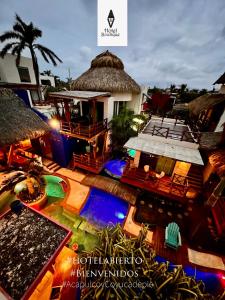 an aerial view of a resort with a swimming pool at A&V Hotel Boutique in Acapulco