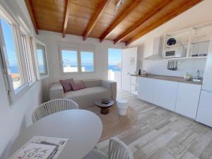 Kuchyň nebo kuchyňský kout v ubytování Eden Gomera Suites