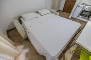Kuchyň nebo kuchyňský kout v ubytování La Casetta del Porticciolo