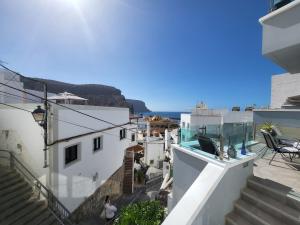 a view from the balcony of a house at Apartamento Makai in Puerto de Mogán