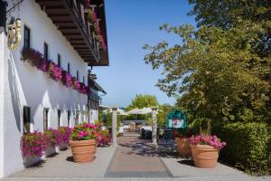 Κήπος έξω από το Arabella Jagdhof Resort am Fuschlsee, a Tribute Portfolio Hotel