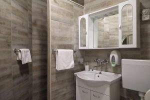Koupelna v ubytování Apartment Kali 14116e