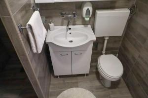 Koupelna v ubytování Apartment Kali 14116e