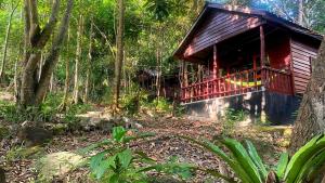 a cabin in the middle of a forest at Sambath Sakseth Bungalow in Koh Rong Island