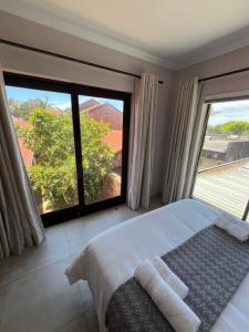 Ένα ή περισσότερα κρεβάτια σε δωμάτιο στο Vigne Palm Inn +28 φωτογραφίες
