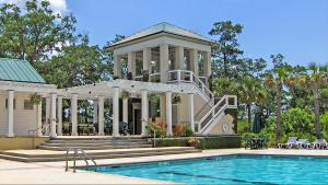 a house with a swimming pool and a gazebo at Cherokee Farms Flat - New Listing in Habersham in Beaufort