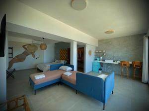 Voodi või voodid majutusasutuse 1 Corcega Beachfront Suites toas
