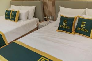 Voodi või voodid majutusasutuse THE ELITE HOTEL toas
