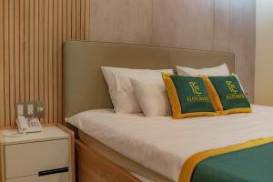 Voodi või voodid majutusasutuse THE ELITE HOTEL toas
