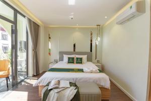 Voodi või voodid majutusasutuse THE ELITE HOTEL toas