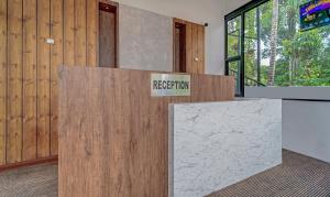 Fotografie z fotogalerie ubytování Treebo Regalia Inn Civil Station v destinaci Kalpatta