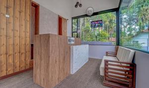 Fotografie z fotogalerie ubytování Treebo Regalia Inn Civil Station v destinaci Kalpatta