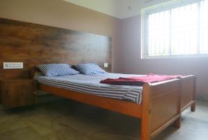 Chakalakkal Residency客房内的一张或多张床位