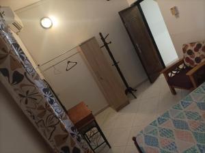 a view of a room with a cross on the wall at Brise de Mer Appartement meublé in Djibouti