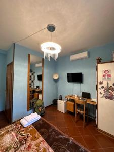 TV a/nebo společenská místnost v ubytování Signor Suite Colosseo