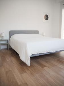 מיטה או מיטות בחדר ב-Ceccarini 2023