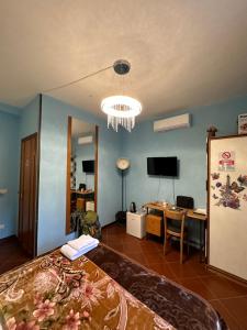 TV a/nebo společenská místnost v ubytování Signor Suite Colosseo